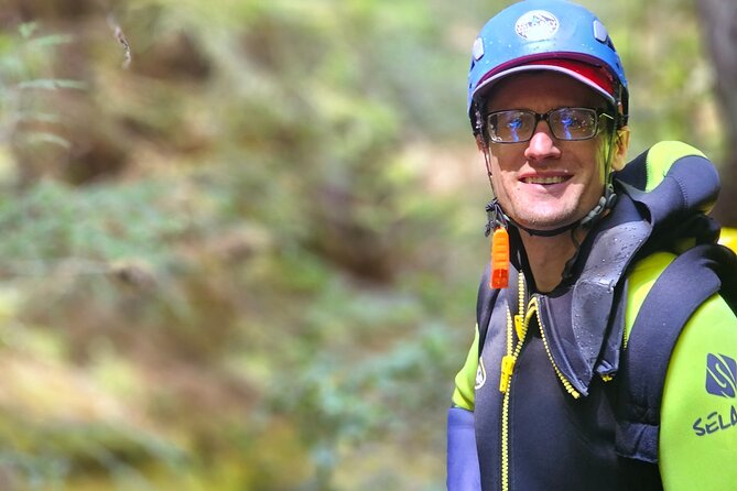 Waterfall Rappelling Canyoneering Adventure + Photo Package! - Rappelling, sliding, jumping, and zip lining